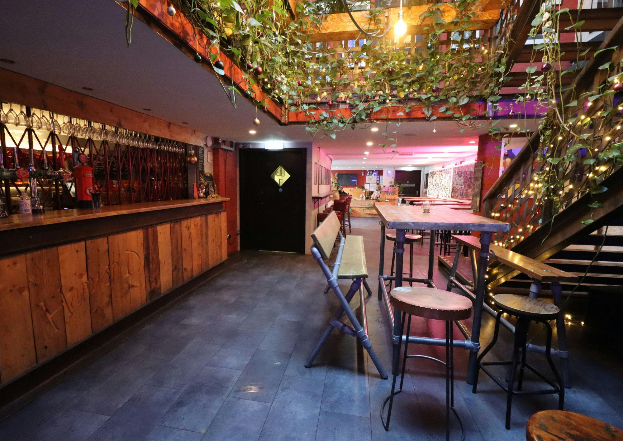 Foyer & Bar at Pleasance Theatre, rustic bar, ideal for networking and events.