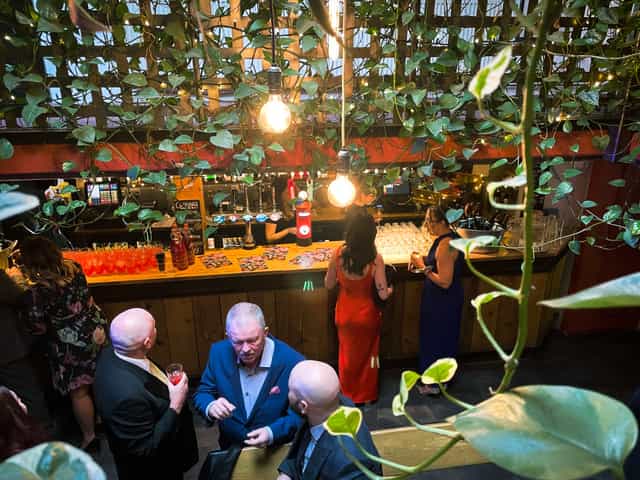Vibrant Pleasance Theatre bar with guests mingling, ideal for networking events.