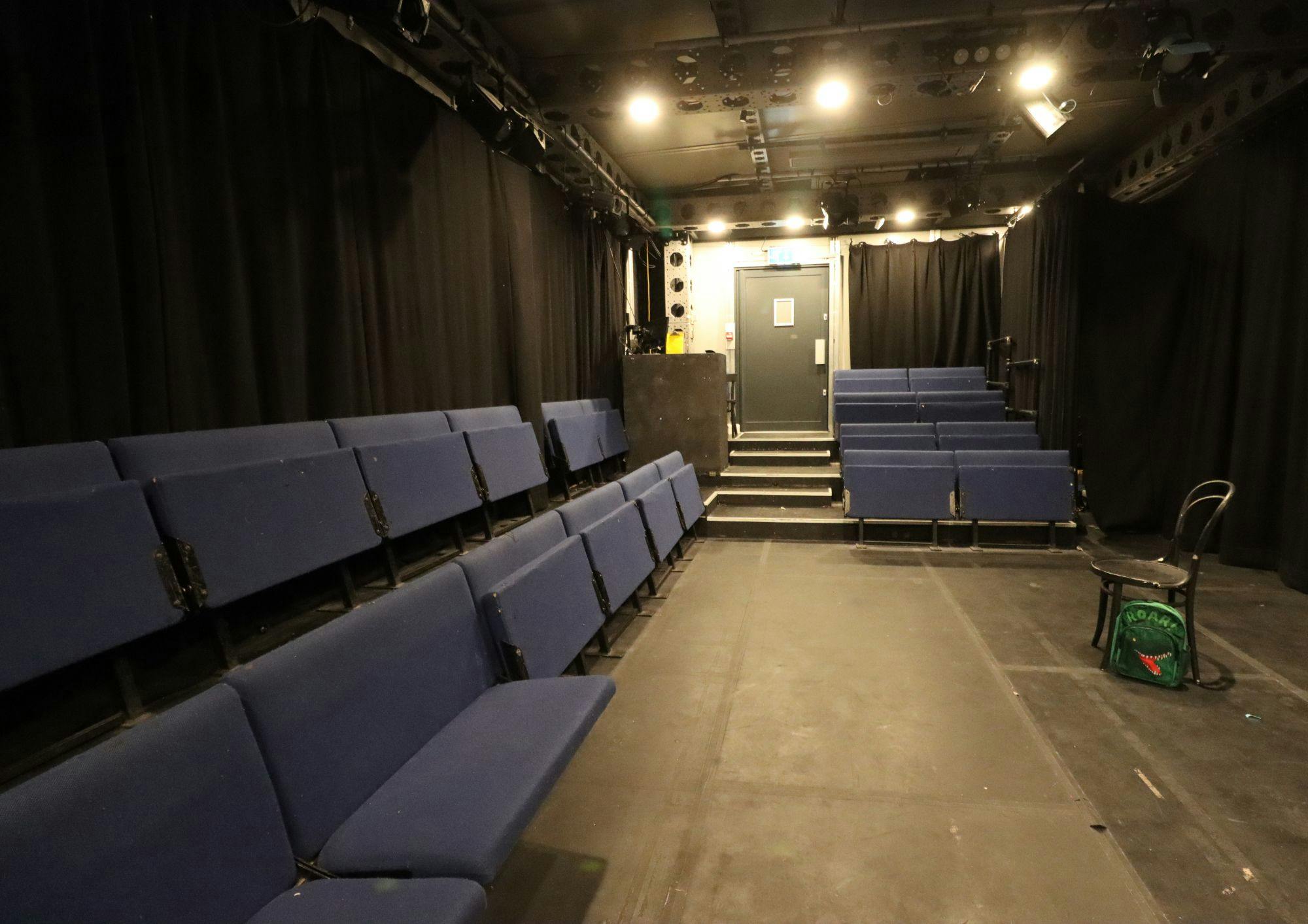 Intimate Pleasance Theatre & Bar with tiered seating for performances and workshops.