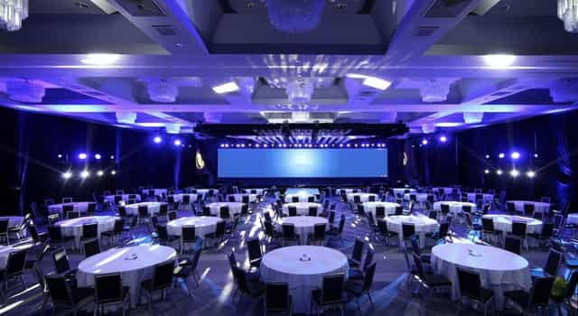 Symphony Ballroom at Hilton Miami Downtown, elegant conference space with blue lighting.
