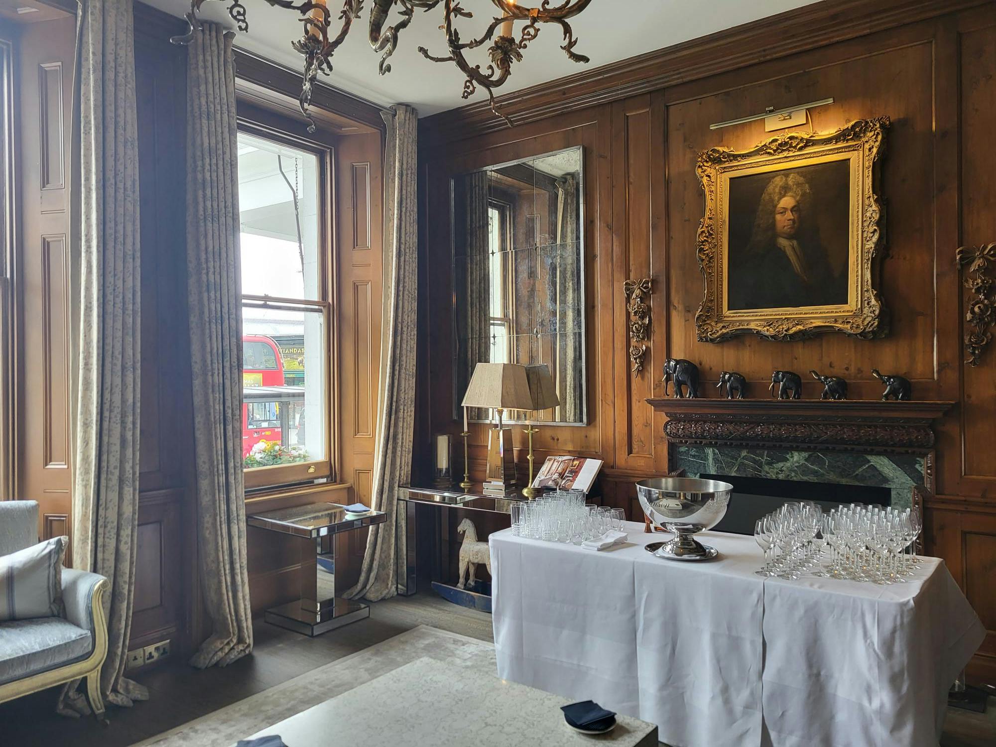 Elegant meeting space in The Pelham Hotel with wood paneling, perfect for receptions.