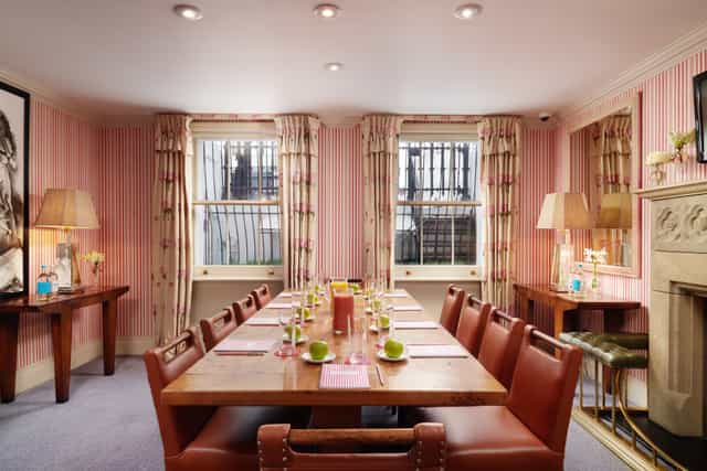 Elegant meeting room at The Pelham Hotel, ideal for intimate gatherings and events.