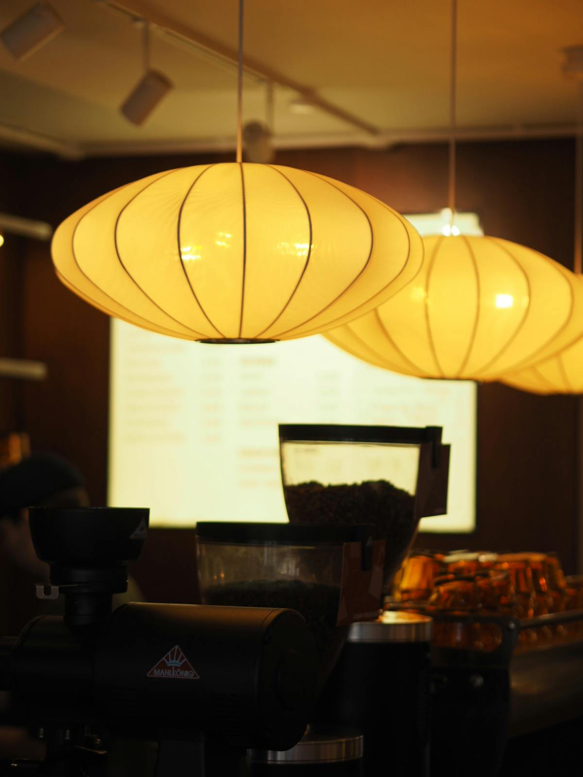 Cozy networking space with soft lighting and coffee setup for casual meetings.