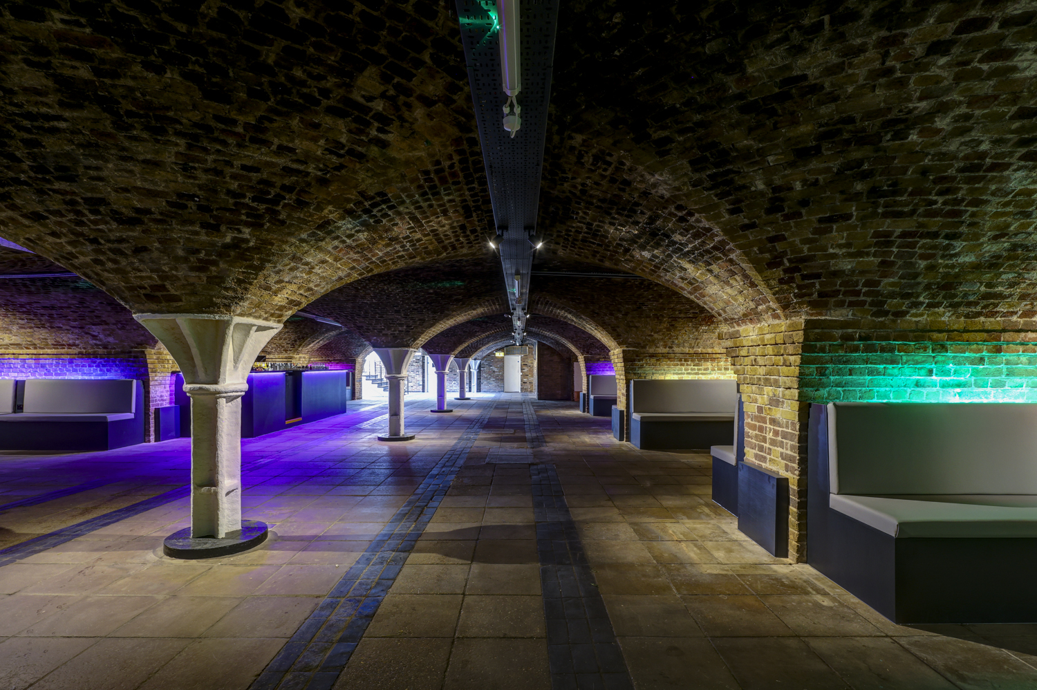 Versatile Dockside Vaults venue with arched brick ceilings for events and gatherings. - Banner