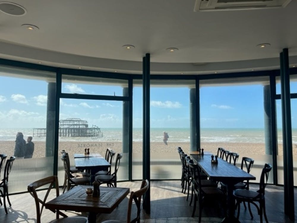 Bright beach venue with panoramic views, ideal for events and gatherings.