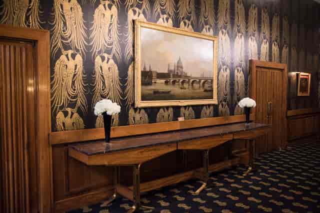 Elegant event space at The Charter Gallery with floral arrangements for receptions.