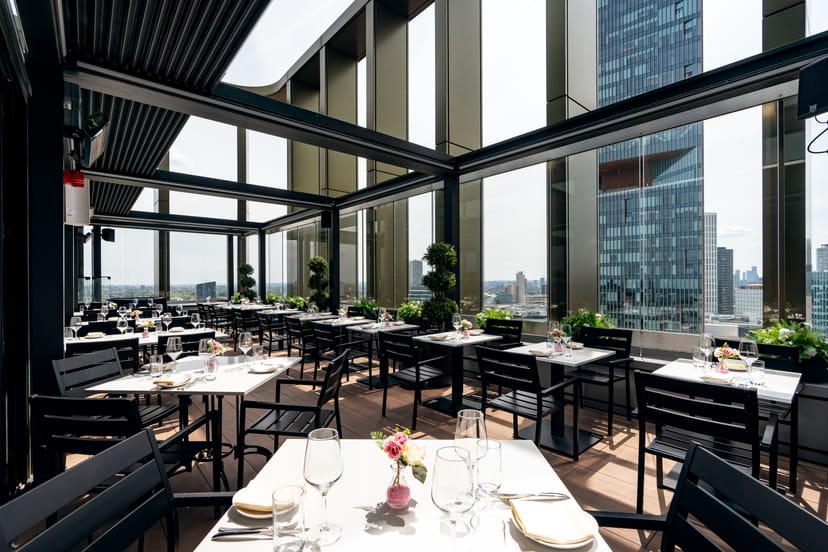 Private dining room terrace at STK Rooftop Stratford, ideal for upscale events and receptions.