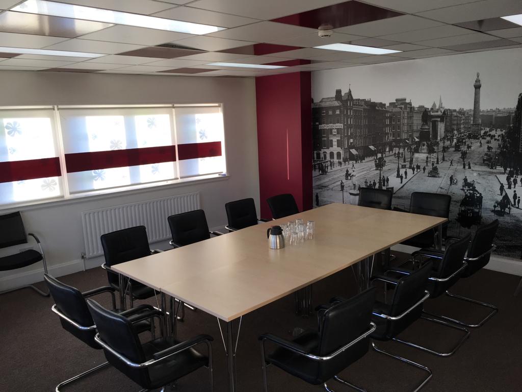Hopkins & Hopkins Meeting Room with spacious table for professional gatherings and brainstorming.