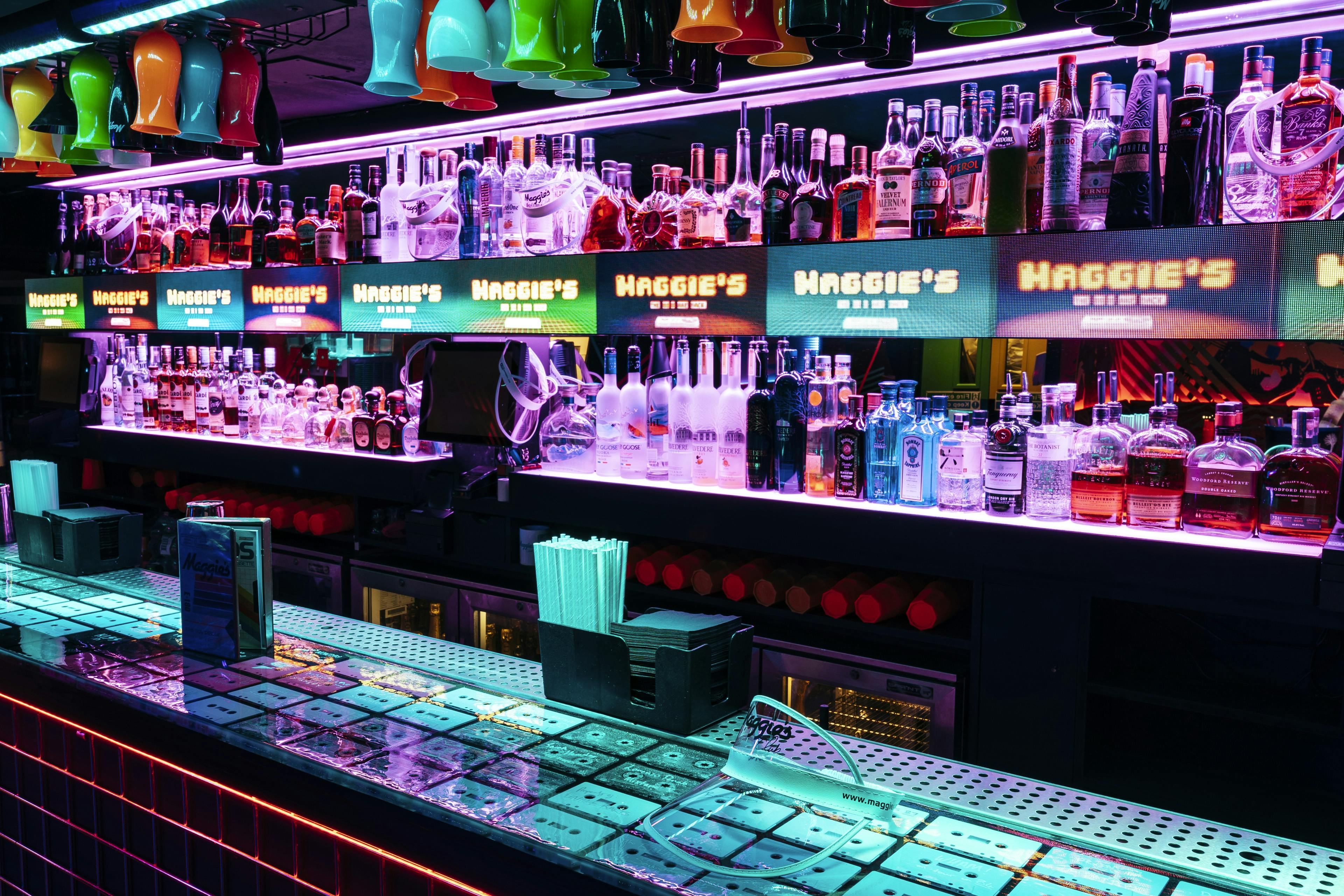Vibrant bar setup at Maggie's Whole Venue, perfect for social events and networking.