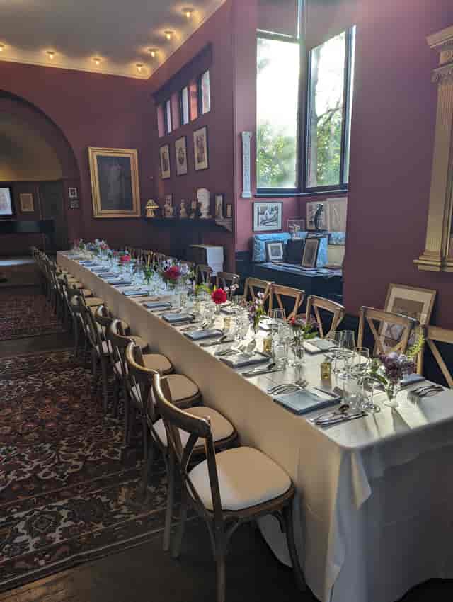 Elegant dining table in Artist's Studio, Leighton House for intimate gatherings.