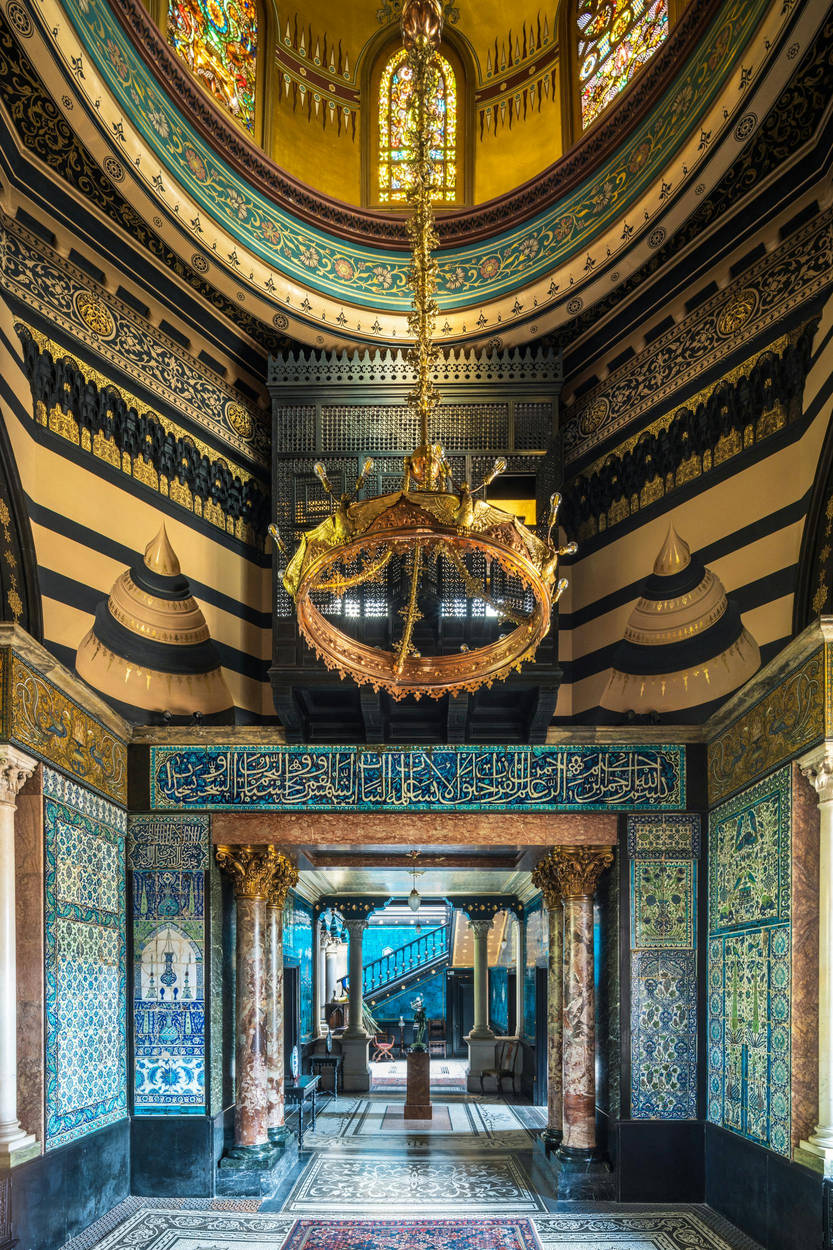 Arab Hall in Leighton House with ornate chandelier, perfect for upscale events and weddings.