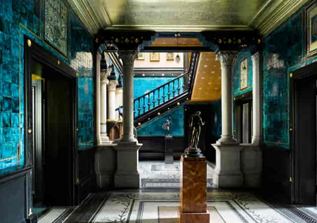 Arab Hall in Leighton House with turquoise tiles, ideal for upscale events and gatherings.