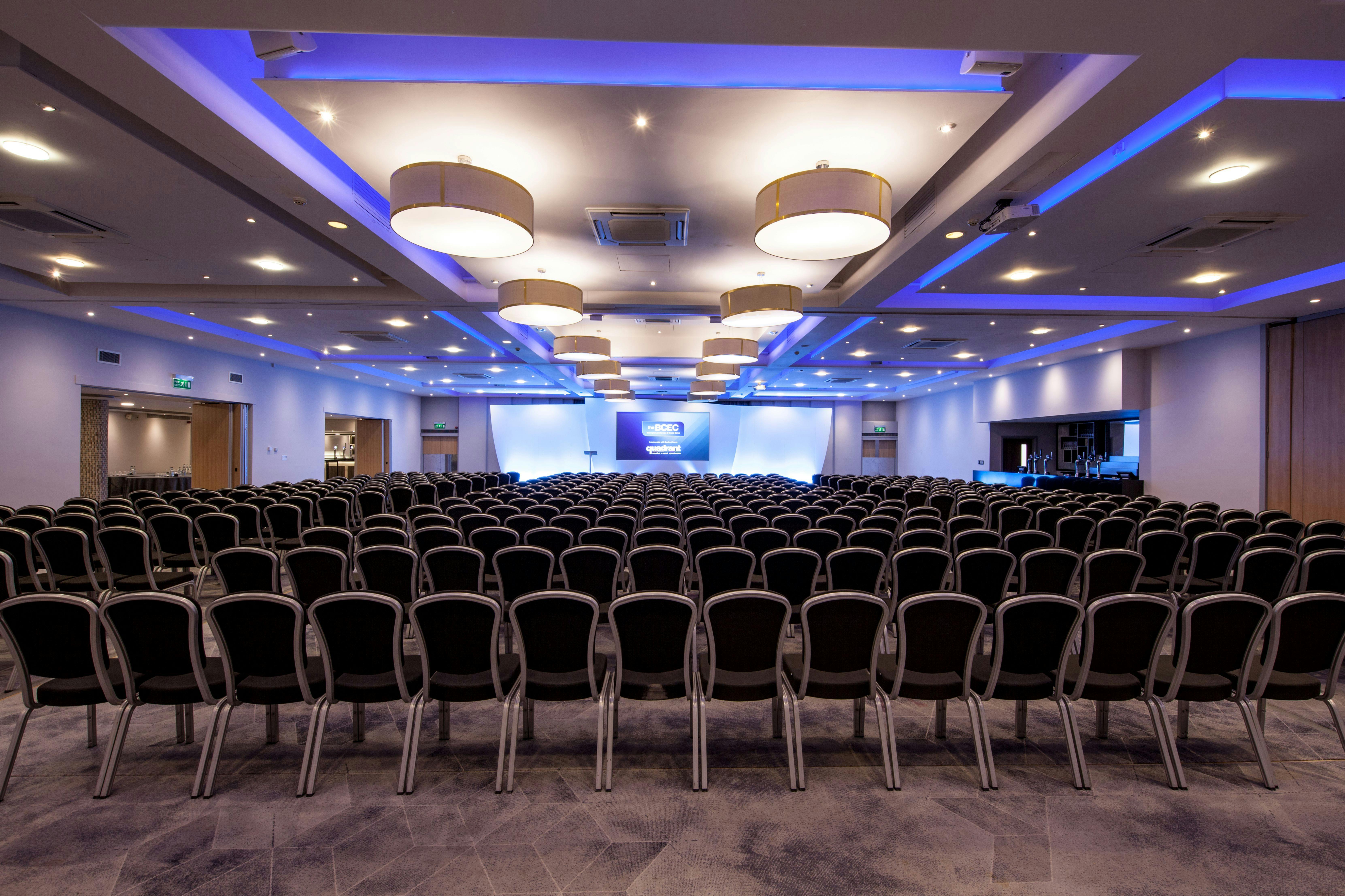 Spacious conference room at The Mercian, ideal for seminars and presentations.