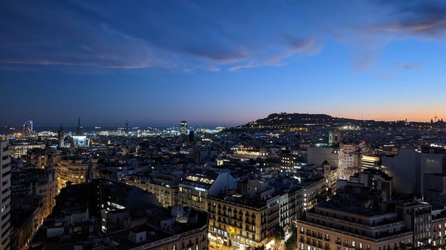 Twilight cityscape at The 19th Hole, perfect for evening receptions and gala dinners.