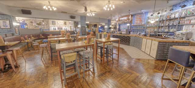 Versatile event space in The Alice with stylish decor, ideal for networking and receptions.
