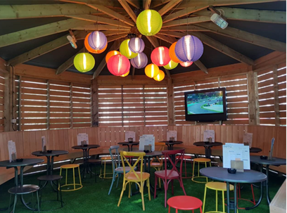 Vibrant meeting space with colorful lanterns for casual gatherings and brainstorming sessions.