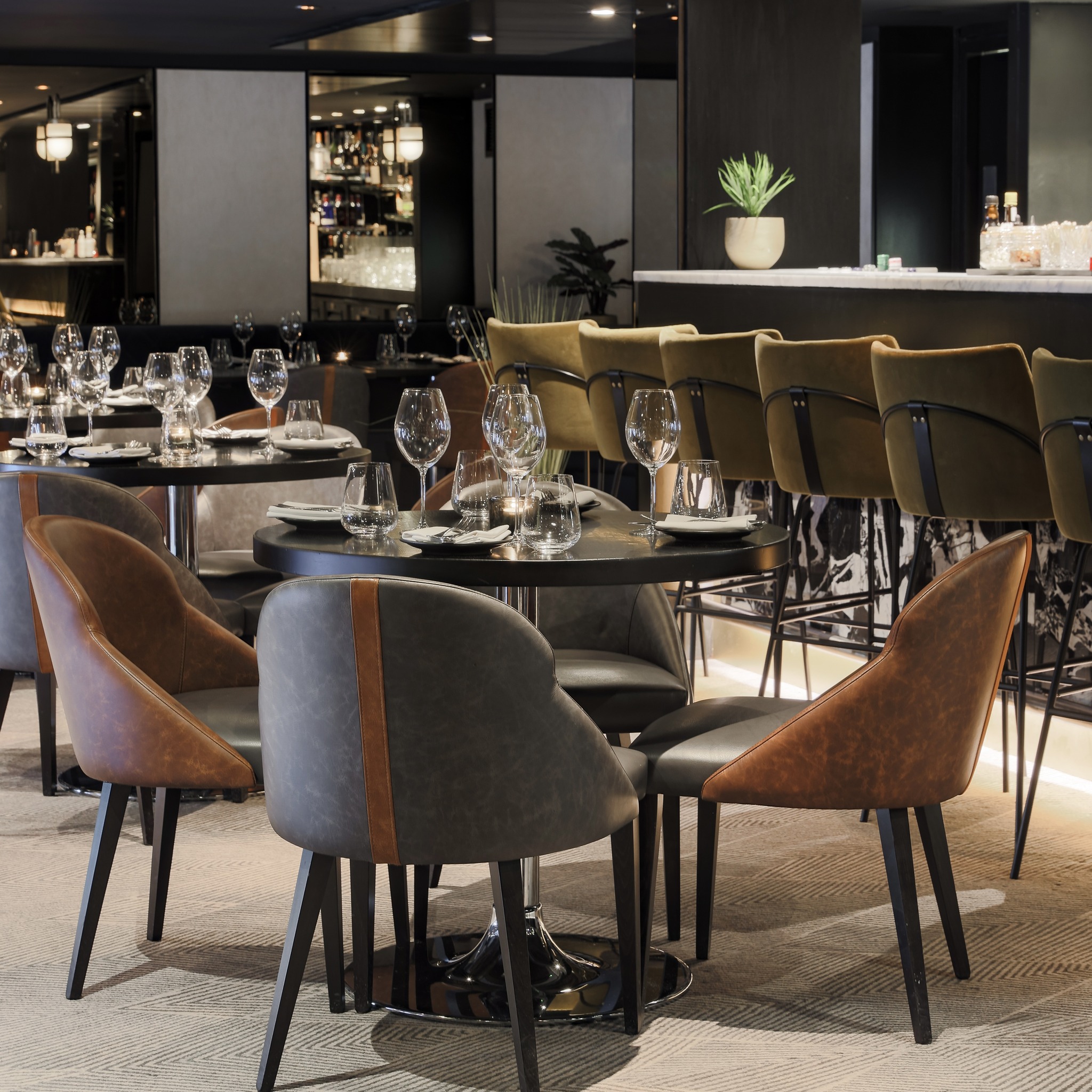 Stylish dining setup at Gaucho, Canary Wharf for intimate events and meetings.