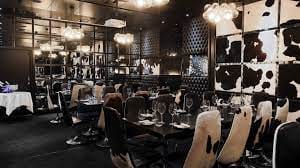Stylish dining space in Andes Room, Piccadilly, perfect for corporate dinners and gatherings.