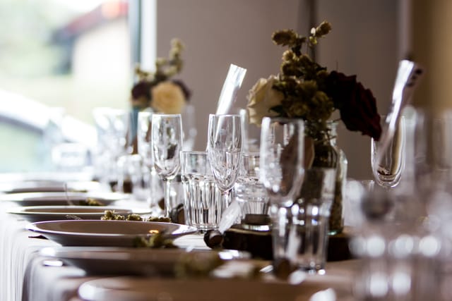 Elegant dining table at Rising Cafe, Anchor Point, perfect for formal events.