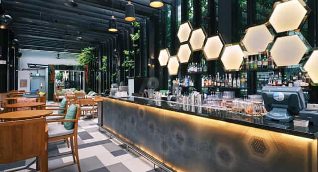 1927 Rooftop Bar at Hotel Telegraph Singapore, modern design, ideal for networking events.