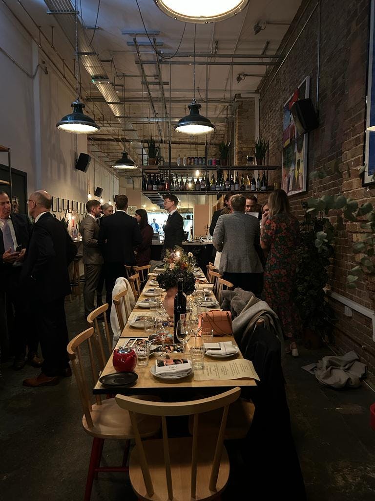 Sophisticated event space with elegant dining table for intimate gatherings in Hackney.