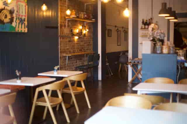 Cozy venue with rustic decor for intimate meetings and small events.