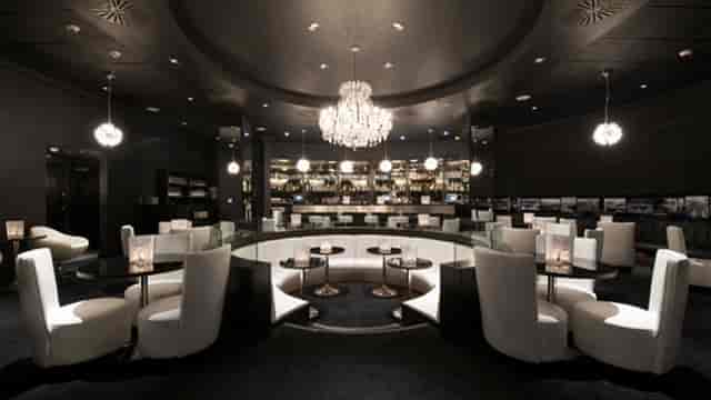 Sophisticated event space at The O2 with elegant chandelier for upscale gatherings.