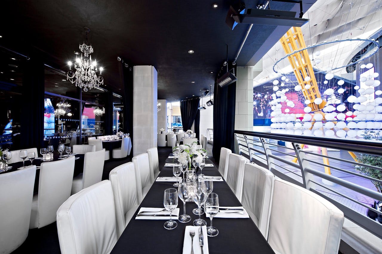 Sophisticated bar area at The O2, featuring elegant seating for corporate events and celebrations.