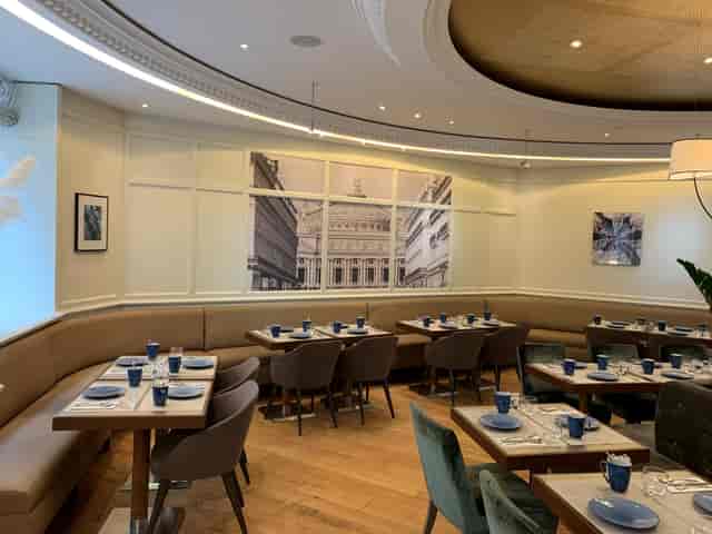 Elegant dining space at Hotel Edouard 7, perfect for intimate meetings and events.