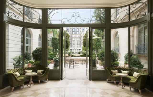 Elegant Salon Louis XV at Ritz Paris with garden view, perfect for events and gatherings.
