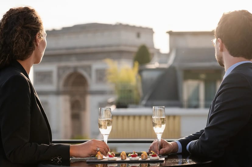 Elegant networking event at Salon La Pagerie, Hotel Napoleon with stunning backdrop.