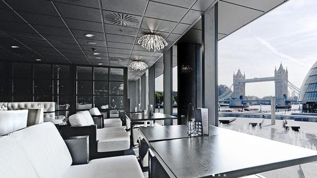 Modern event space at Tower Bridge with elegant decor, perfect for networking and gatherings.