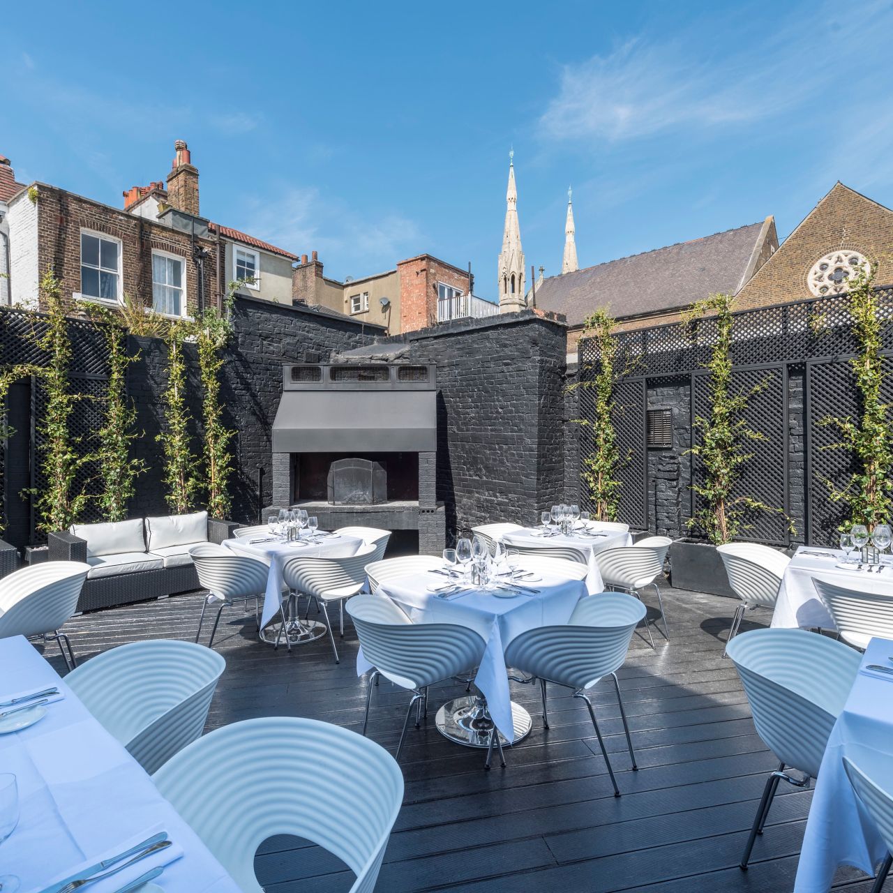 Stylish outdoor event space at Gaucho Hampstead, ideal for upscale gatherings and dining. - Banner