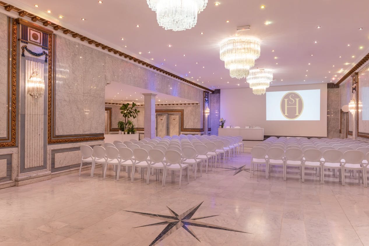 Elegant Salon Etoile with chandeliers, perfect for weddings and corporate events.