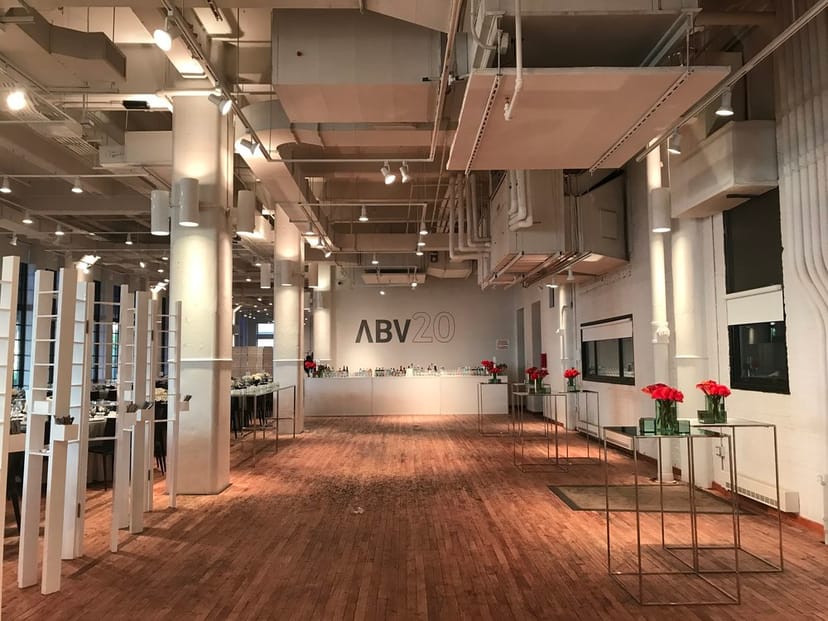 Spacious modern event venue in West Edge with high ceilings, ideal for corporate meetings.