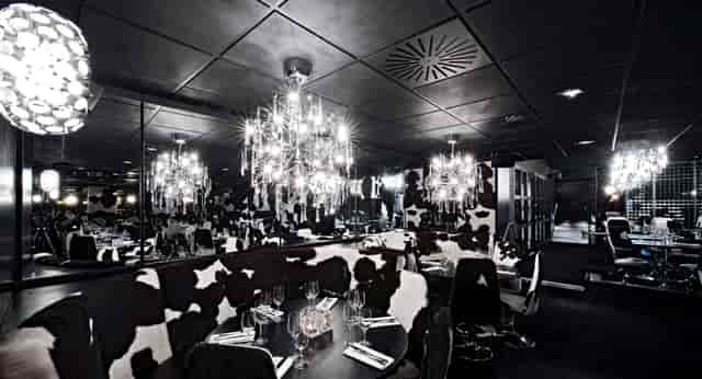 Stylish dining venue in Leeds with cow-print decor, perfect for events and themed dinners.
