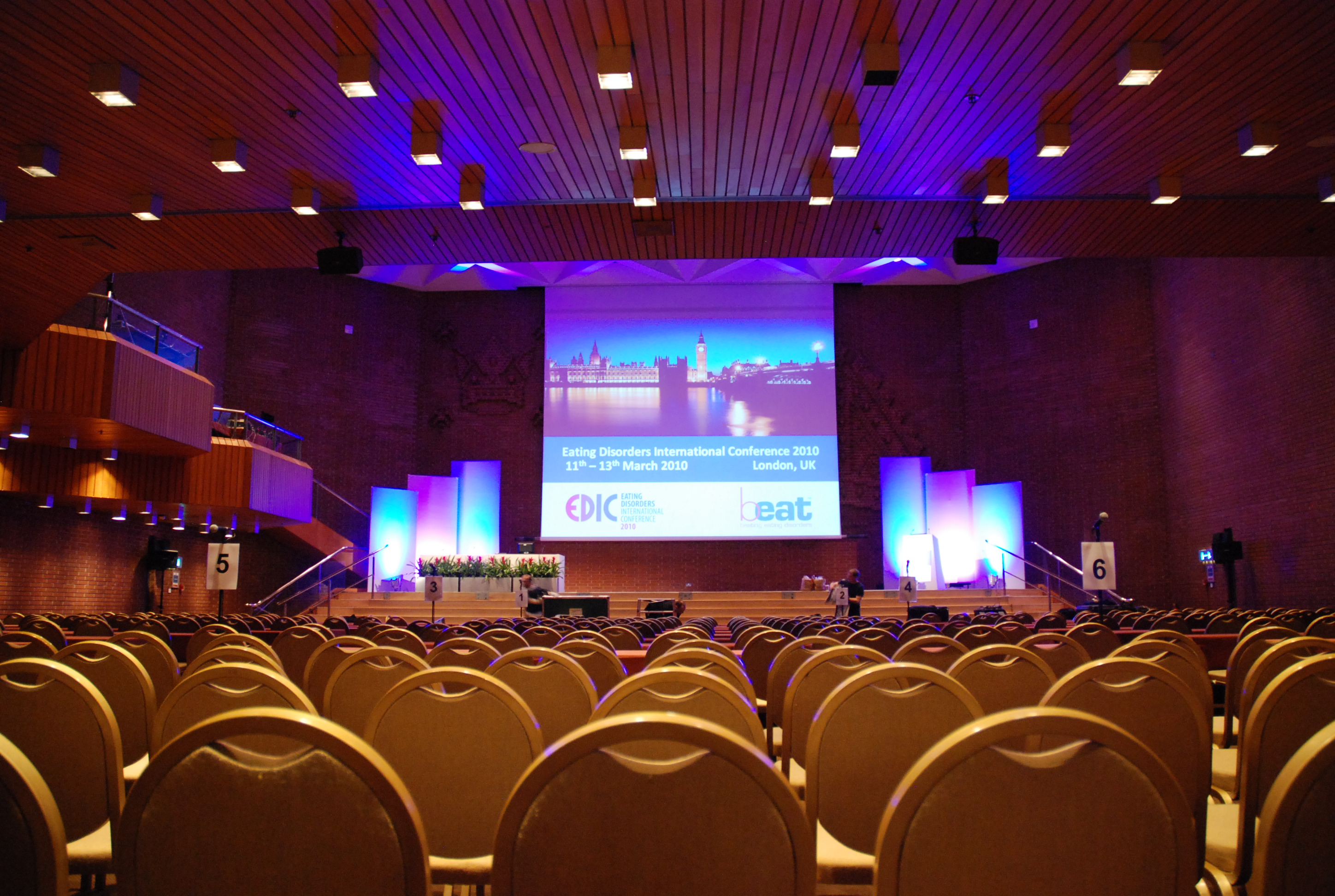 Great Hall at Kensington Centre, spacious conference setup with elegant seating. - Banner