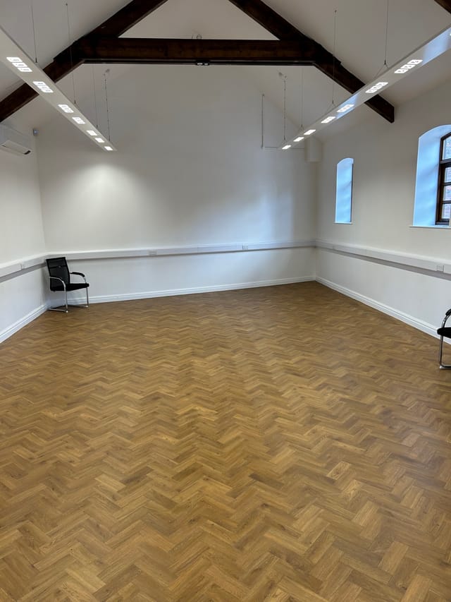 Versatile meeting room at One Knowsley, ideal for workshops and small gatherings.