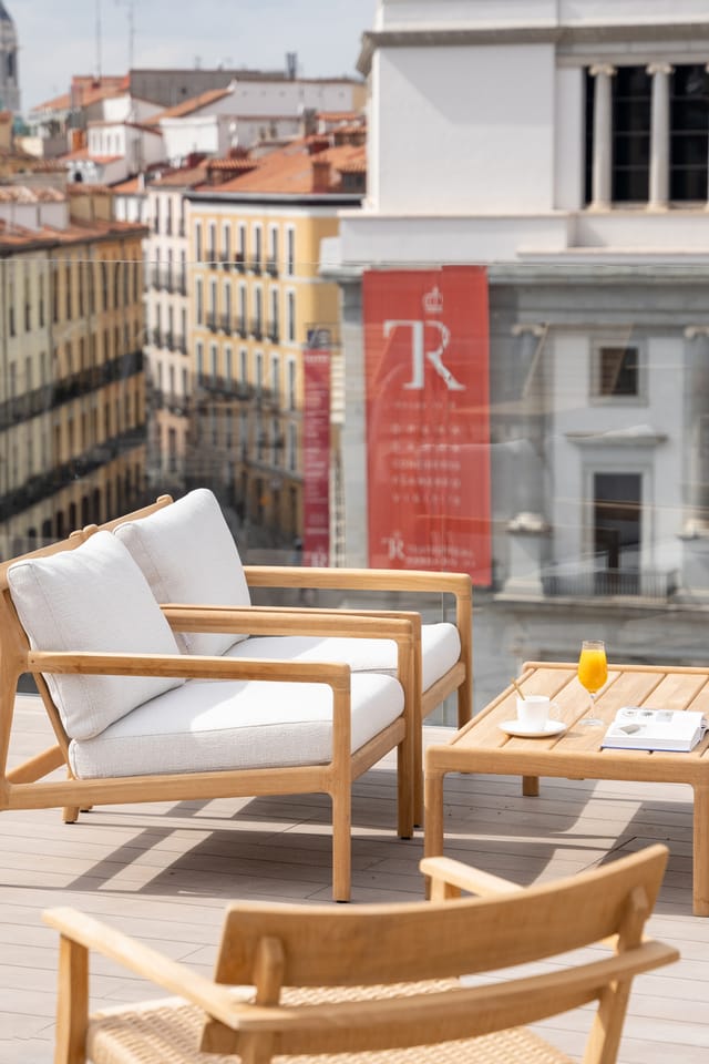Stylish outdoor seating at Ocean Drive Madrid Hotel, perfect for networking events.