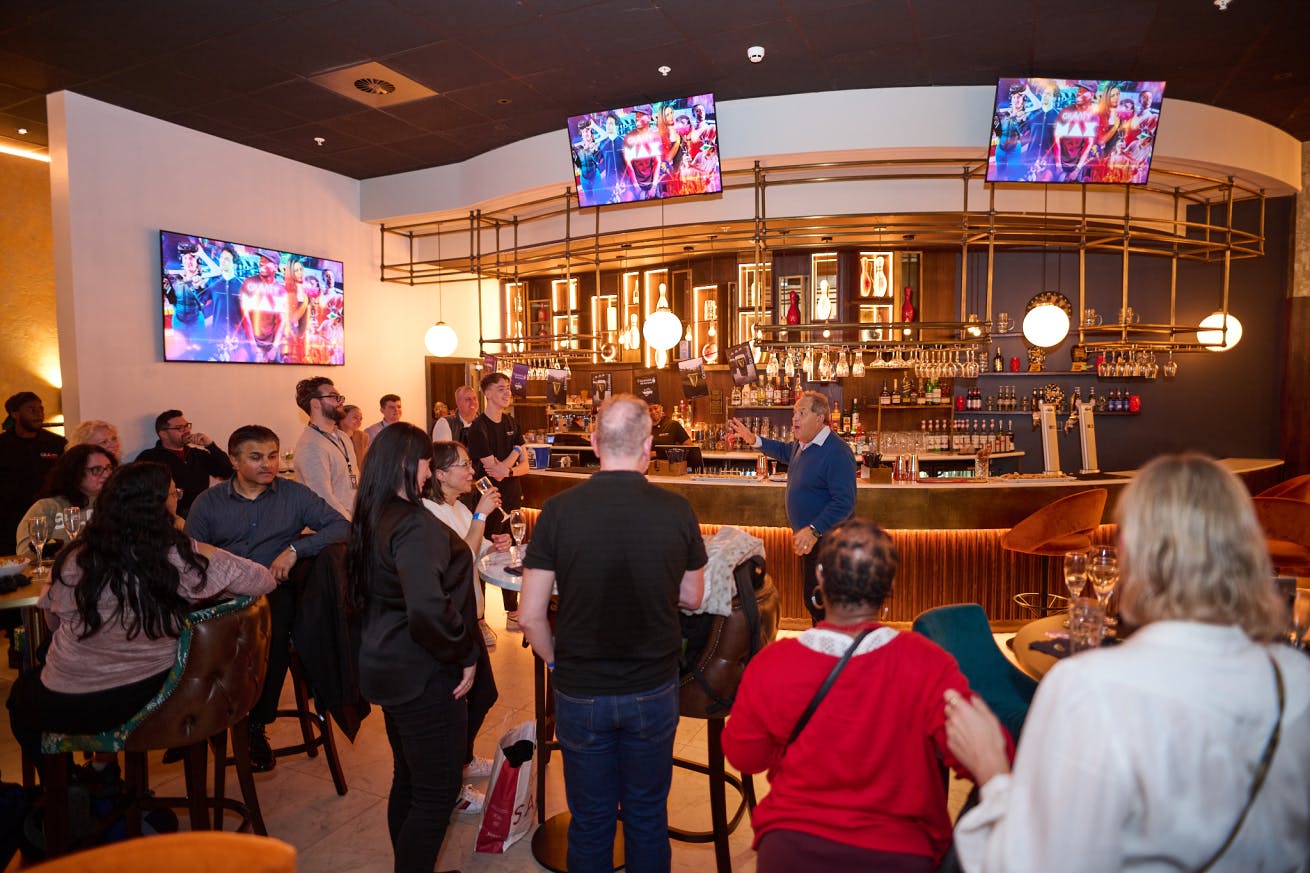Vibrant networking event at Newton's Bar, modern venue in Wandsworth.