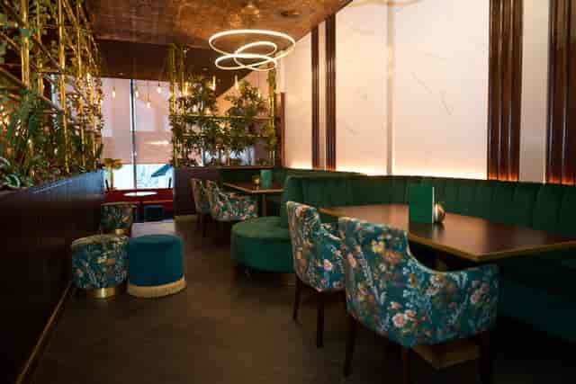 Stylish event space at Newton's Bar, featuring plush seating and elegant decor.