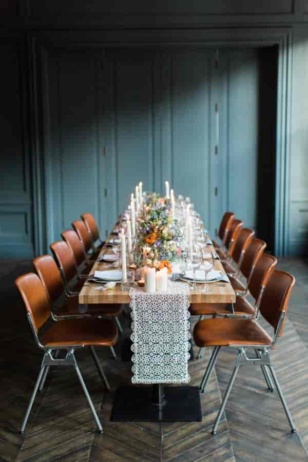 Elegant dining table with floral centerpieces in The Dean Dublin's Blue Room.