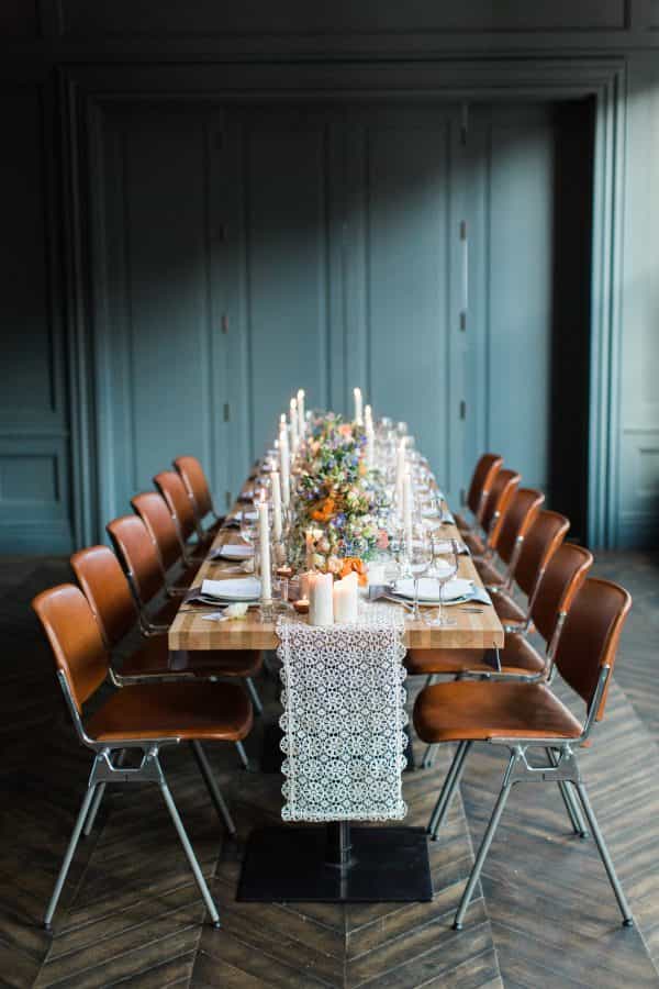 Elegant dining table with floral centerpieces in The Dean Dublin's Blue Room.