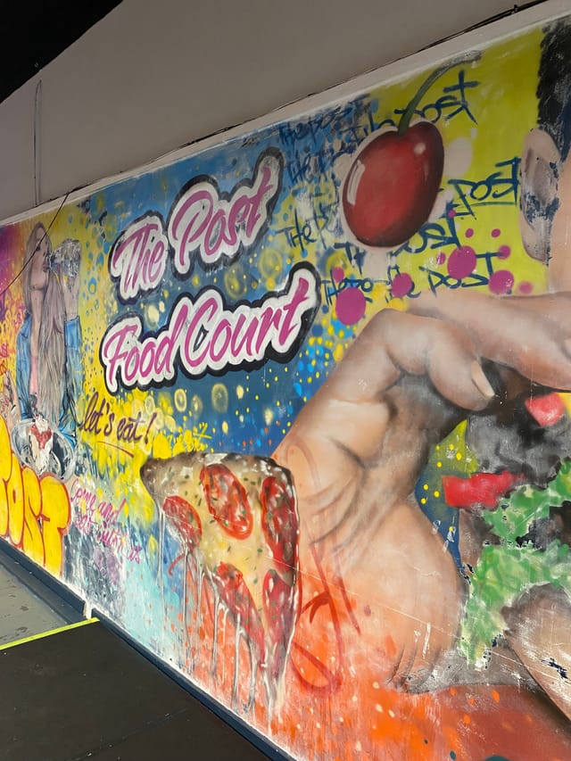 Vibrant mural at The Post in Post Market, perfect for casual gatherings and networking events.