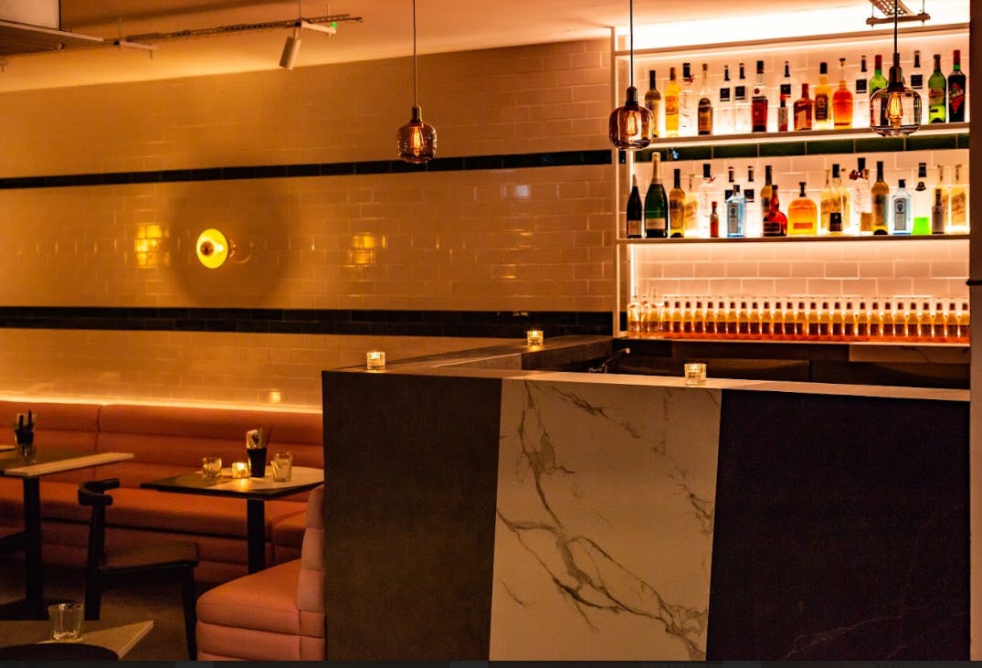 Stylish bar at Unique Events - The Lounge, ideal for cocktail receptions and networking.