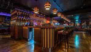 Stylish bar at Bartley's Lounge, ideal for networking events and intimate gatherings.