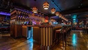 Stylish bar at Bartley's Lounge, ideal for networking events and intimate gatherings.