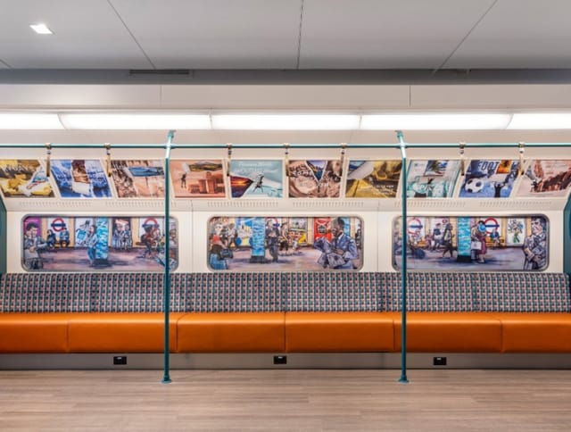 Central Park Suite subway train interior with vibrant artwork for events and networking.