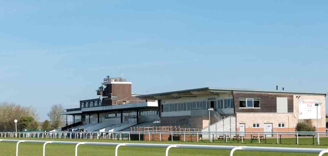 Huntingdon Racecourse outdoor venue with ample seating for events, weddings, and gatherings.