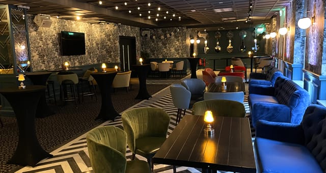 Iveagh Suite event space with stylish seating, ideal for networking and gatherings.